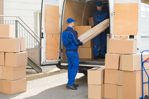 Removal van and packed boxes for house removals in Roehampton