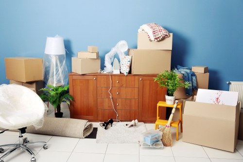 Professional movers arranging furniture removals in Roehampton