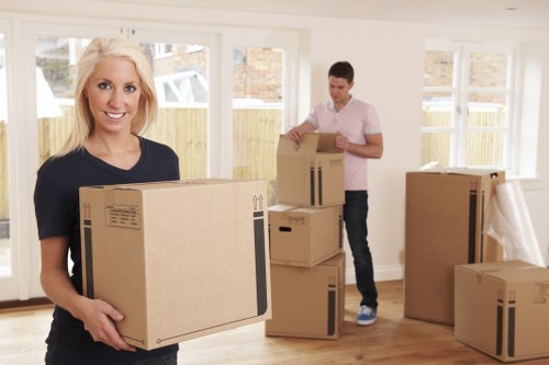 Organized storage unit in Roehampton with packed boxes and furniture