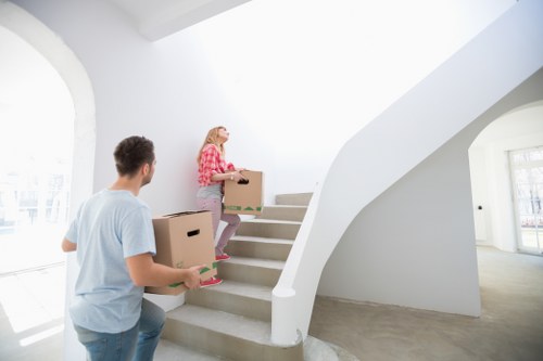 Local Roehampton same day removals team transporting boxes