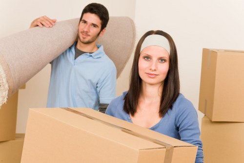 Packed boxes and furniture loaded for transport in Roehampton